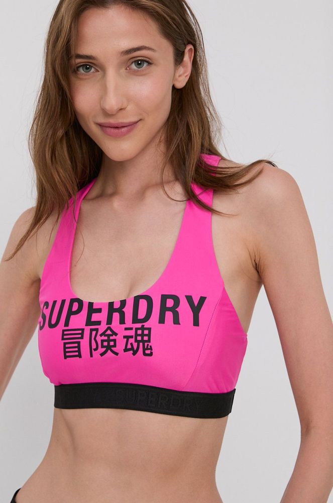 Купальний бюстгальтер Superdry колір рожевий м'яка чашечка (1595832)